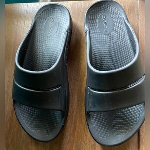 Oofos black slide sandals